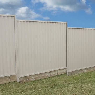 Light Colorbond fence installed along a residential boundary